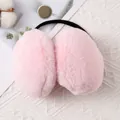 Cozy soft pink plush winter earmuffs for women and men featuring a flexible black headband - Compact Warm Earmuffs / Pink
