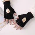 Schwarze fingerlose Strickhandschuhe mit süßem Hamster-Aufnäher für warme Hände im Winter. - Hamster Kürbis Stil