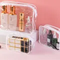 Set mit drei transparenten, wasserdichten PVC-Kosmetiktaschen für Reiseartikel - S / 15 Seide (15x10.5x7cm) / Weiß