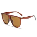 Fashionable oversized semi-oval sunglasses with transparent amber frame and brown tinted lenses. - C4 Tea Frame Tea Lens