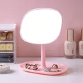 Elegant pink rotatable desktop makeup mirror with a built-in jewelry storage tray - Pink