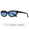 Lunettes de soleil œil de chat vintage avec monture noire brillante et verres bleu clair. - Monture Noir Brillant Lentille Bleu Clair