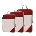 Set of three red compression packing cubes for travel luggage and clothing organization - Three-Piece Set / Red