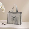 Grey mesh nylon storage bag with storage bag text and bow tie design - Grey Large / 40x35x14cm