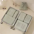 Sage green Taslan 7-piece travel luggage organizer set for efficient clothes packing - Matcha Green