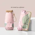 Mini portable pink floral sun umbrella with a matching gold-framed floral storage pouch - 6-Fold Umbrella / Pale Pink (Mist Flower City)