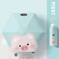 Portable mint green UV sun umbrella with cute pink pig pattern in compact size - Surprise Pig (Mint Green)