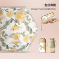 Portable folding sun umbrella with yellow chrysanthemum pattern and matching pouch - Golden Flower