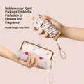 Compact floral sun umbrella and matching storage purse set for portable UV protection - Pouch Bag Style (Cherry Blossom) / 40% Off