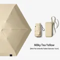 Compact mini flat capsule umbrella for sun protection in stylish milk tea yellow - 6-Rib 6-Fold Card Bag Umbrella / Macaron Series / Milk Tea Yellow