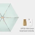 Compact mint green mini folding sun umbrella featuring UPF50+ UV protection rating - Mint Green