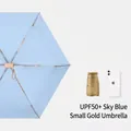 Sky blue UPF 50+ mini capsule sun umbrella with compact golden folding storage case - Light Blue