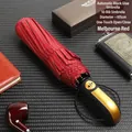 Large 10-rib folding automatic umbrella in Melbourne Red with elegant gold dot pattern - 10-Rib Automatic / Wine Red with Gold Stripes
