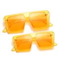 Stylish orange parent-child sunglasses set featuring trendy flat-top square candy color frames. - Transparent Orange Frame Orange Lens (C14)
