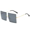 Lunettes de soleil carrées sans monture avec branches dorées et verres gris océan. - Gris Noir