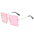 Lunettes de soleil carrées sans monture avec verres roses et une monture en métal doré - Lentille Rose