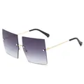 Lunettes de soleil oversize sans monture avec verres dégradés violets et monture dorée - Gris Dégradé