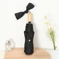 Elegant black folding sun umbrella with a decorative large bow and wooden handle - Japanese] Folding Wooden Handle-Black / Sun protection folding umbrella series