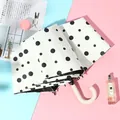 Stylish white folding umbrella with black polka dots and a cream curved handle for sun protection. - Small Hook] Small Dot-White / Sun protection folding umbrella series