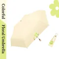Compact cream five-fold sun umbrella featuring a cute green flower accessory design - 18cm Five-Fold Flower Bud Umbrella / Creamy Yellow