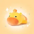 Niedliches gelbes Wasserschwein Plüschtier Stofftier Puppe mit einer kleinen Orange auf dem Kopf - 30 cm / Bauchlage Schmollen