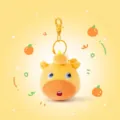 Süßer gelber Wasserschwein Plüsch-Schlüsselanhänger mit Orangen-Deko für Taschen - 8cm / Neugieriger Ausdruck / Squishy Anhänger