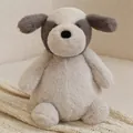 Soft plush puppy dog toy in beige and grey colors featuring a cute sitting pose - Dog