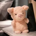 Mignonne peluche cochon rose doux avec texture laine frisée sur table de chevet - Cochon Rose / 20cm