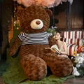 Large brown teddy bear plush toy wearing a classic black and white striped sweater - 80cm (1kg) / Dark Brown (Blue White Striped Style)
