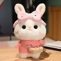 Cute white rabbit plush toy wearing a pink sweater and bow headband - Pink Headband And Pink Sweater With Bag