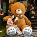 Giant brown teddy bear plush toy with striped scarf and heart patterns - 80cm / Yellowish Brown (Scarf Style)