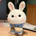 Cute white bunny plush toy wearing a blue knitted sweater and a small messenger bag - Blue Sweater With Yellow Carrot And Bag