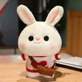 White plush bunny doll wearing red heart sweater and brown crossbody bag - Red And White Heart Sweater With Bag