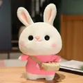 Adorable white plush rabbit toy wearing a pink knitted sweater and a small crossbody bag - Pink Sweater With Bear Head And Bag