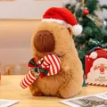 Christmas capybara plush toy wearing Santa hat holding candy cane with bells - Scepter Style / 25cm