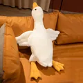 Grande cuscino di peluche a forma di oca bianca morbidissimo con ali aperte su divano - Confezione da 50cm / Bianco