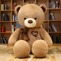 Large brown plush teddy bear with a bow tie and Love heart embroidery on its chest. - Dark Brown / 80cm