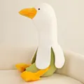 Creative banana goose plush toy duck pillow variant sitting on a cozy cream sofa - Green / 50cm