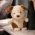 Peluche chiot crème et marron toute douce sur une table en marbre élégante - Chiot Marron