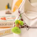 Joli porte-clés en peluche cocotier de plage suspendu à un sac en toile blanc - Pendentif Palmier