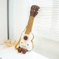 Cute guitar shaped plush toy with smiley face and adjustable yellow strap for kids - 25cm / Guitar Doll