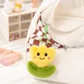 Cute yellow plush tulip flower keychain with a happy smiley face on a white canvas bag - Yellow Flower Pendant