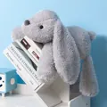 Adorable soft gray floppy-eared bunny plush toy for girls sitting on white book stack - 35cm / Gray