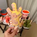 Jouet créatif en peluche de brochette d'Oden avec un adorable visage souriant - Pattes de Poulet