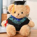 Oso de peluche de graduación con birrete doctoral negro, toga y rollo de diploma - 40CM / Borde Azul / Tostado