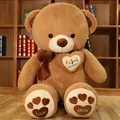 Large brown stuffed teddy bear toy with heart embroidery and soft decorative bow tie - 80cm / Happy Every Day / Tan