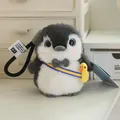 Cute chubby grey and white penguin plush toy charm with small yellow chick accessory - Penguin Brother Grey Keychain / 15cm Pendant