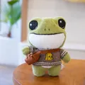 Cute plush green frog toy wearing a sweater and messenger bag on wooden table - 29cm / Brown Dog (dpx-frog)