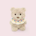 Small fluffy beige teddy bear plush doll wearing a colorful handmade knitted collar - Bear with Shawl