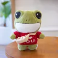 Cute green frog plush toy wearing a red heart sweater and a small beige crossbody bag. - 29cm / LOVE U Sweater (dpx-frog)